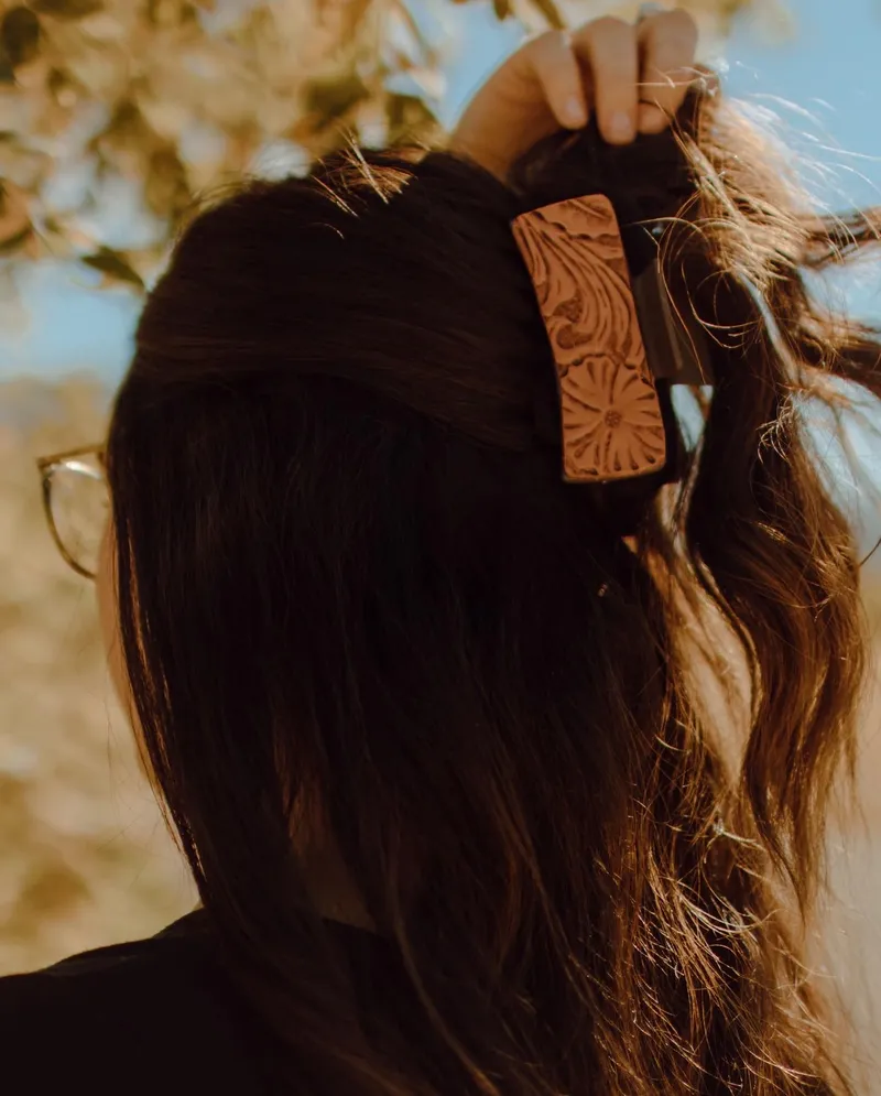 Handmade leather hair clip with tooled design